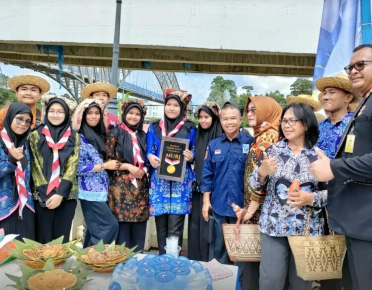 Pramuka Barito Utara Semarakkan Festival Manumpi Jawaw