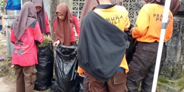 Pramuka Sumpiuh Gelar Aksi “Bersih Praja” Pungut Sampah Tahun Baru