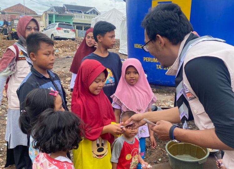 Akhir Tahun 2022, Pramuka Peduli Kwarda Riau Salurkan Donasi Bumbung Kemanusiaan Peduli Cianjur