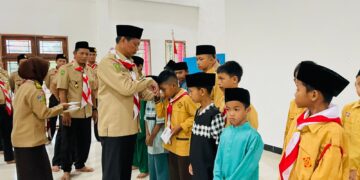 Kwarcab Pelalawan Bagikan Ratusan Takjil dan Santuni Anak Yatim