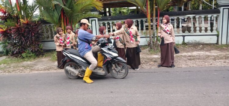 Berbagi Takjil! Ajang Pramuka MI Ma’arif NU 1 Dawuhanwetan Peduli Sesama